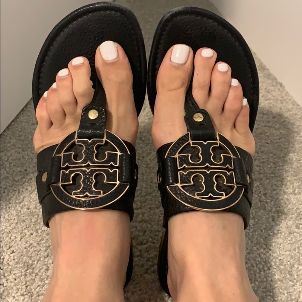 Tory Burch black with gold emblem sandals